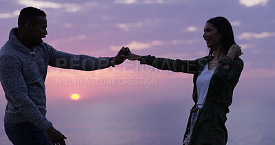 Buy stock photo Sunset, beach and happy couple holding hands on romantic date, holiday adventure or dancing. Evening sky, excited man and woman on travel vacation with love, fun or outdoor journey together at ocean