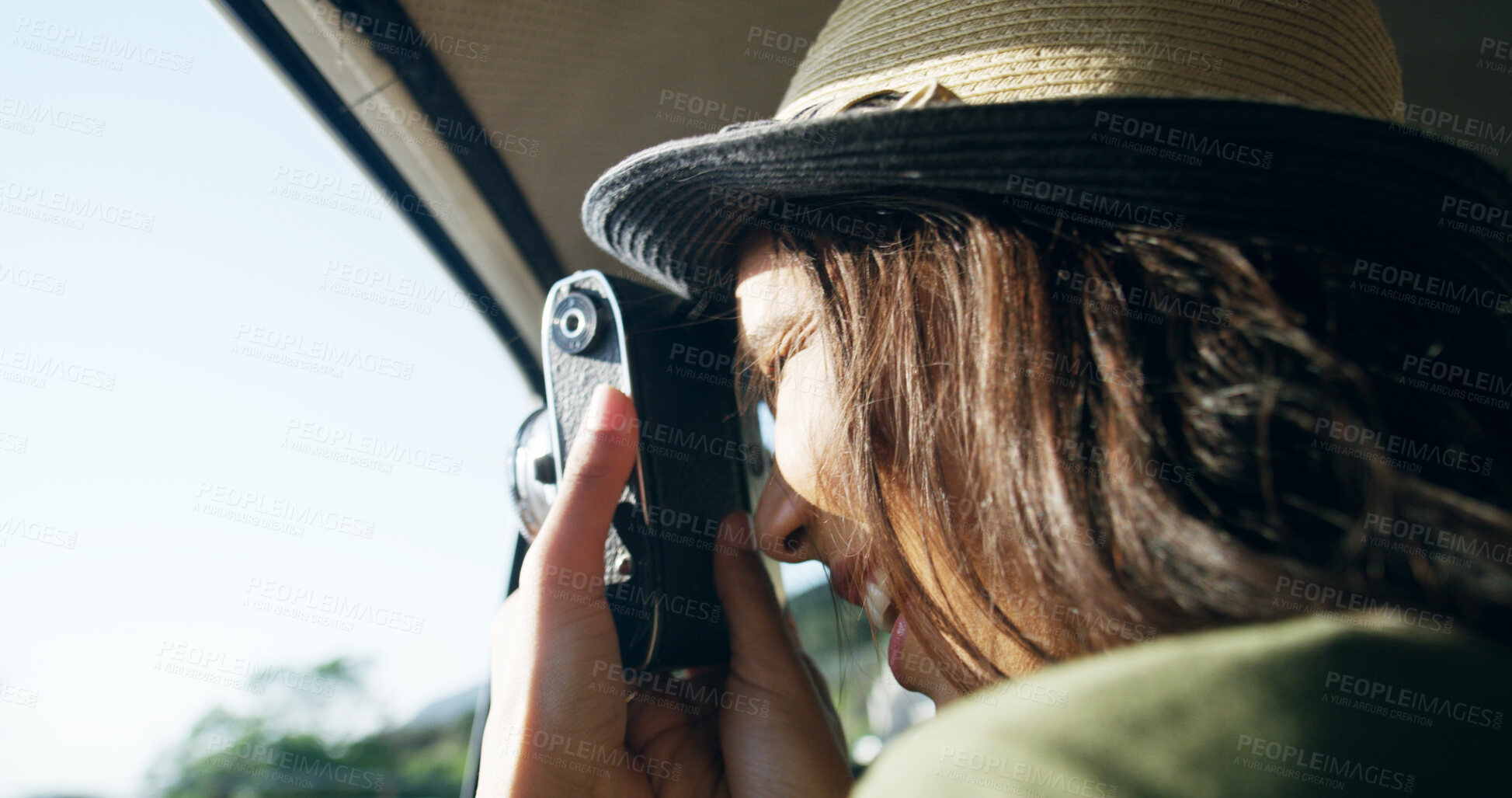 Buy stock photo Woman, road trip and camera with travel, photography and happy for memory by car window on vacation. Person, transportation and smile with inspiration, creativity and excited in vehicle on holiday