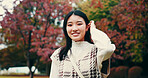 Japanese woman, portrait and outdoor with smile confidence and pride in garden or park. Female person, happiness and biology student at university for relax, calm and beauty in nature or countryside