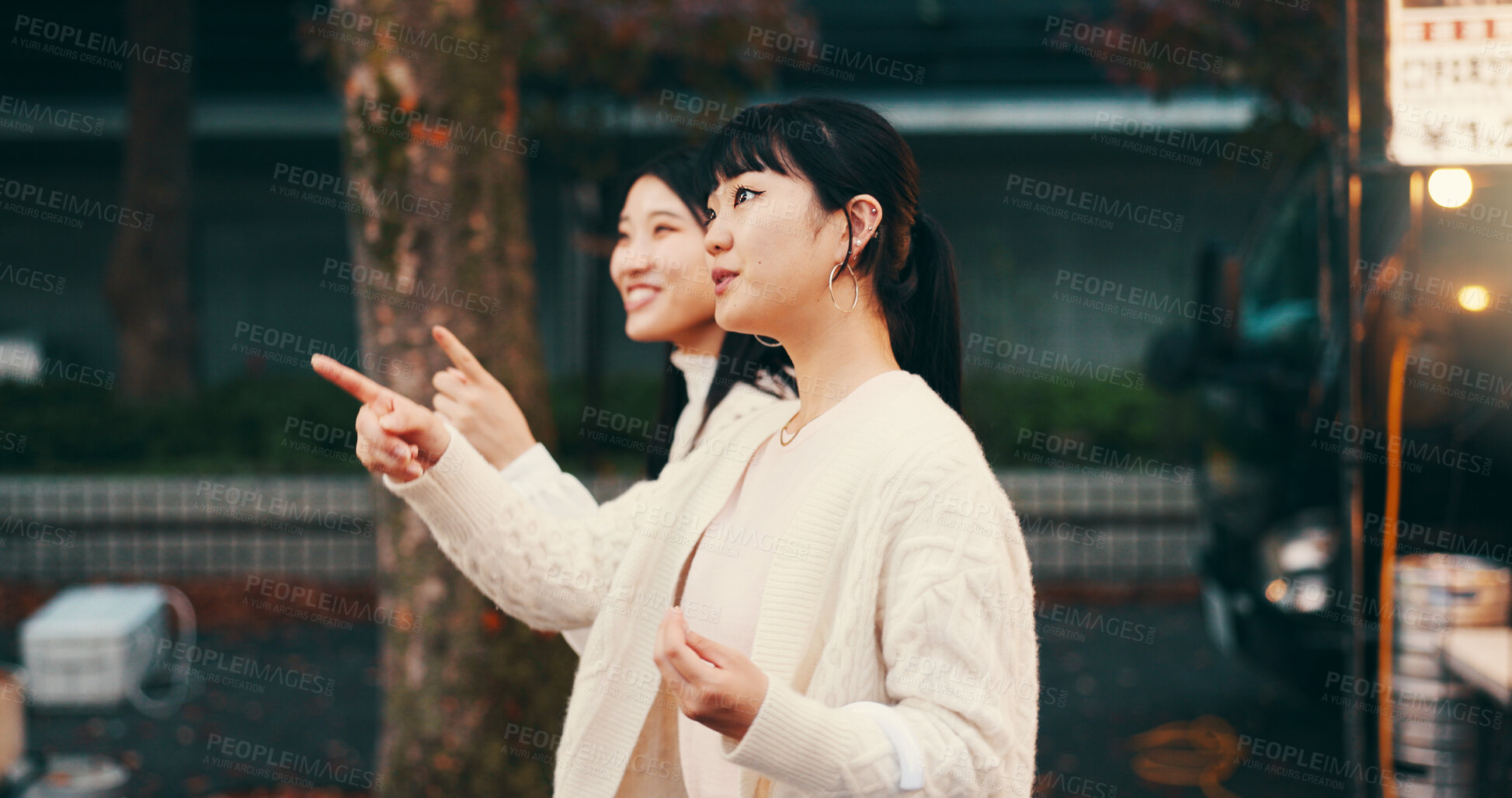 Buy stock photo Travel, vacation and women in market, pointing and journey for tourism, together and friendship in Tokyo. Outdoor, trip and people on holiday, exploring and adventure for traveller, smile and Japan