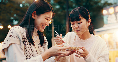 Buy stock photo City, women and friends with street food, eating and snack for people with dumplings, students and travel. Outdoor, treats and celebration of reunion, smile and sharing of poketto mochi and Japan