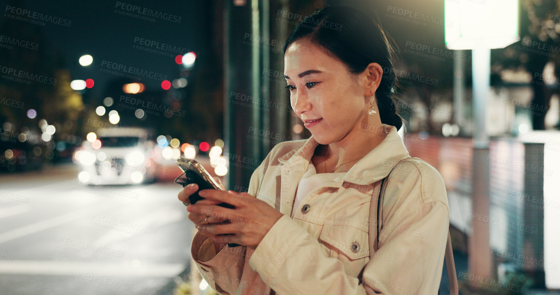 Buy stock photo Night, travel and woman in city with smartphone, connection or checking online location for public transport schedule. Phone, search and Japanese girl in street with mobile app for late urban commute