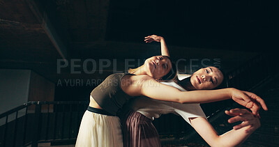 Buy stock photo Japanese women, outdoor and contemporary dance at night for practice, training and choreography. Female people, technique and rehearsal as professional dancer for grace, theater and performance art