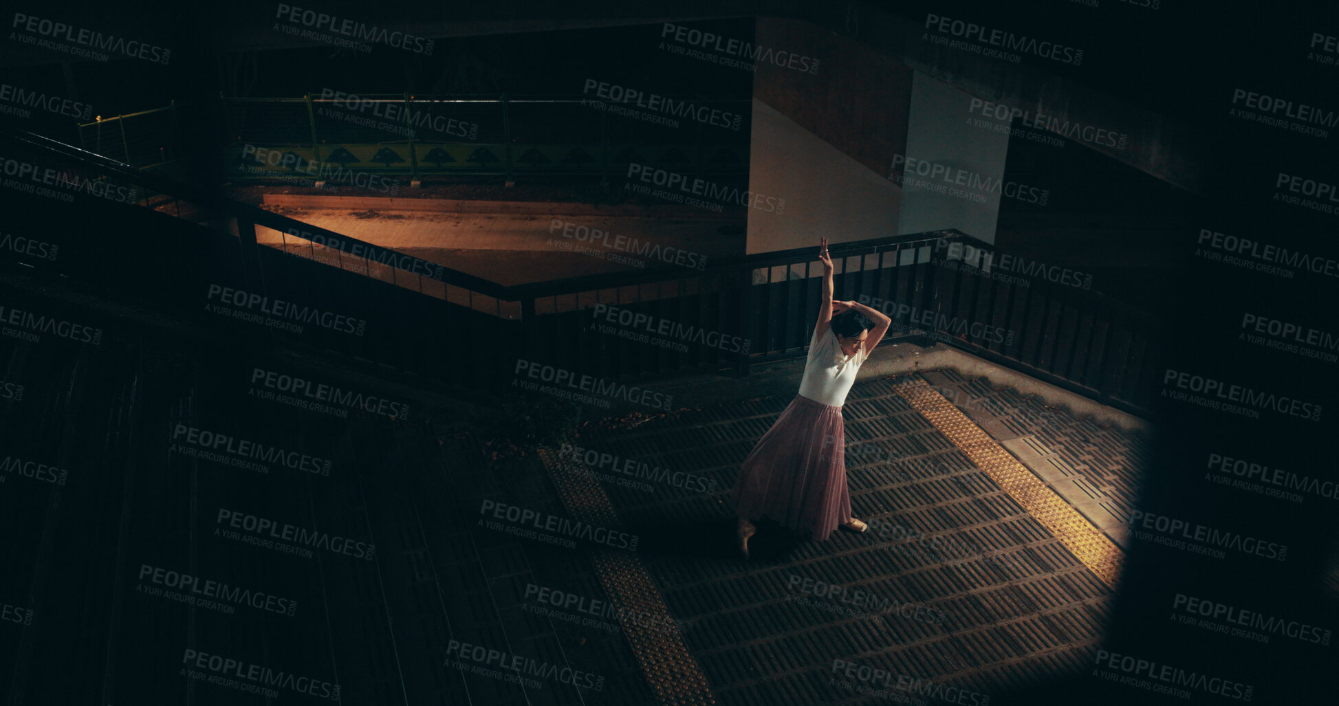 Buy stock photo Ballet, talent and stairs with Japanese woman in city for balance, theater and elegant performance. Dance, artist and feminine with person or ballerina dancer at night for recital, music or practice 