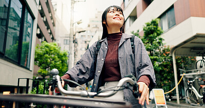 Buy stock photo Travel, thinking and Asian woman with bicycle in city for morning commute, adventure and journey. Location, cycling and person on bike for explore, sustainable and eco friendly transport in Japan