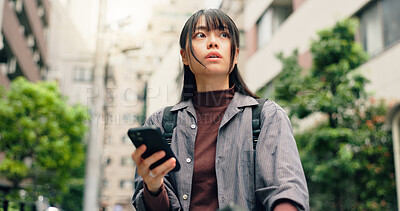 Buy stock photo Phone, thinking and search with Japanese woman in city for location, digital map and travel. Social media, direction and mobile app with person and outdoor for networking, connection and adventure