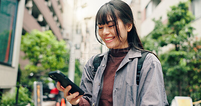 Buy stock photo Phone, search and online with Japanese woman in city for location, digital map and travel. Social media post, communication and mobile app with person in Japan for meme, connection and adventure