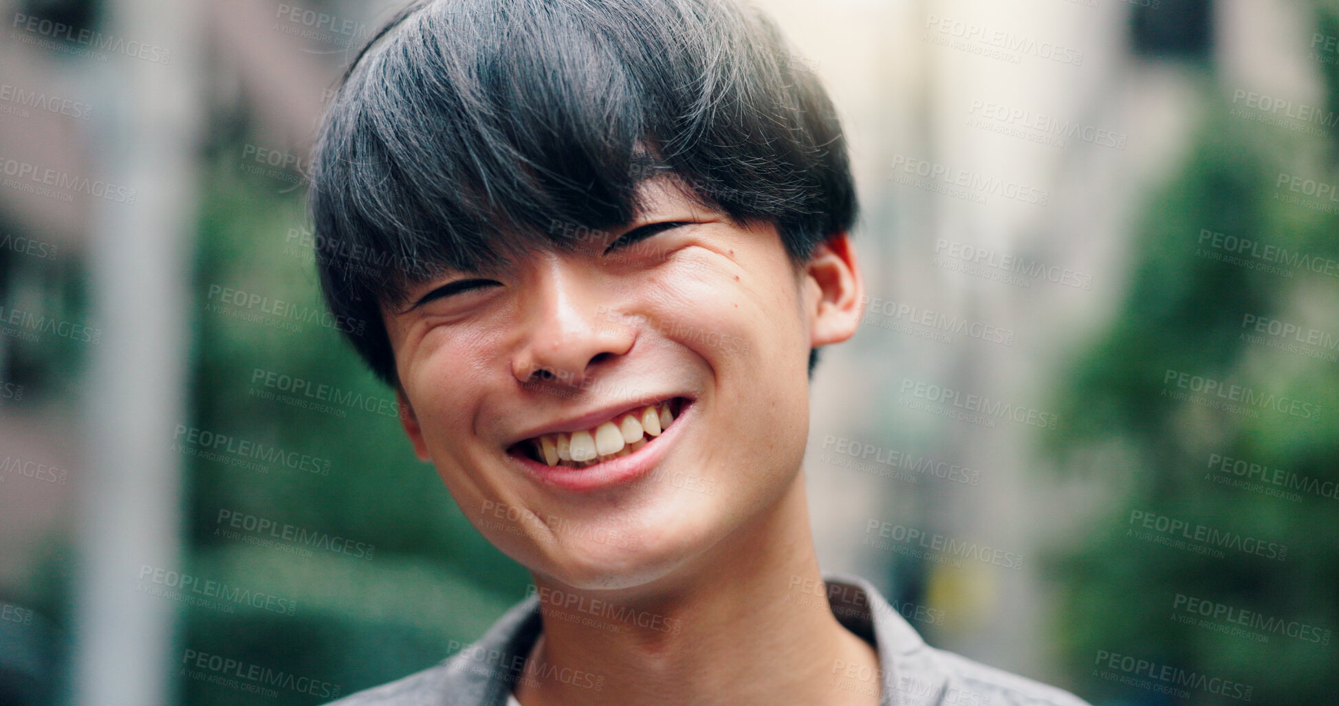 Buy stock photo Laugh, happy and portrait of Asian man in city for university, education and commute to college. Travel, urban town and face of person on street for holiday, break and weekend in Japan outdoors