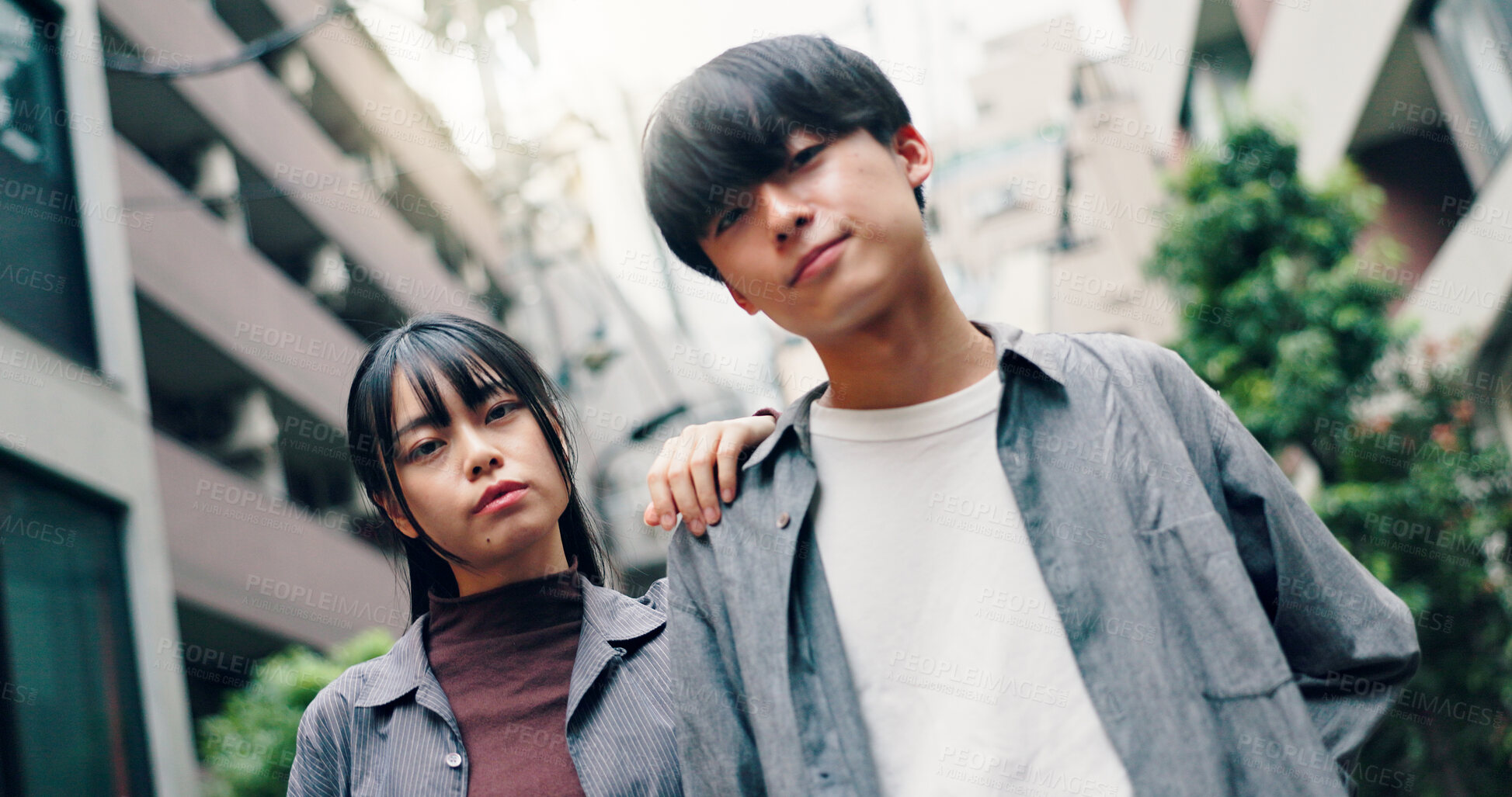 Buy stock photo Japanese couple, portrait and fashion in city with confidence on travel, attitude and summer in street. Man, woman and together with partner, love or bonding for connection in low angle on urban road