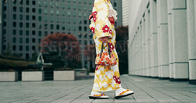 Buy stock photo Feet, walking and woman in city with kimono, morning commute and sightseeing in traditional clothes. Explore, discover and girl with Japanese fashion, sandals and urban culture on travel adventure