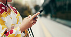 Asian woman, hands and typing with phone in city for communication, online chatting or texting. Japan, closeup or female person with mobile smartphone in kimono for network or app in an urban town