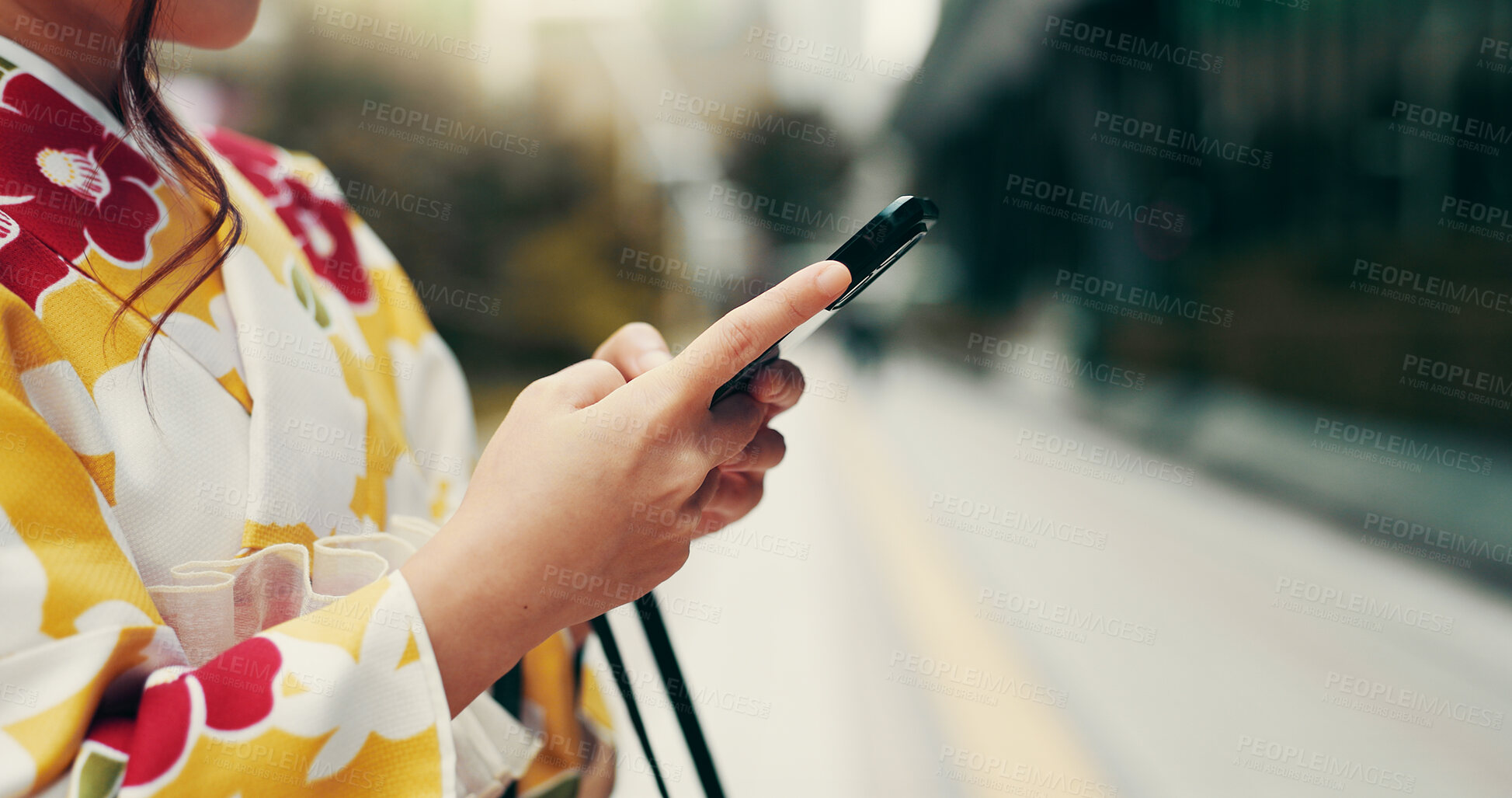 Buy stock photo Asian woman, hands and typing with phone in city for communication, online chatting or texting. Japan, closeup or female person with mobile smartphone in kimono for network or app in an urban town