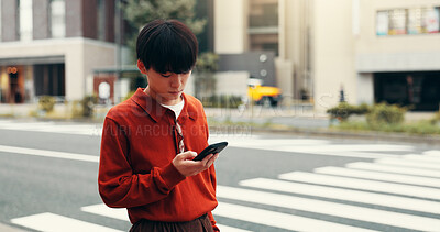 Buy stock photo City, typing and man on crosswalk with phone, morning commute or mobile app for social media post. Urban, travel and Japanese person on pedestrian crossing with smartphone for online connectivity