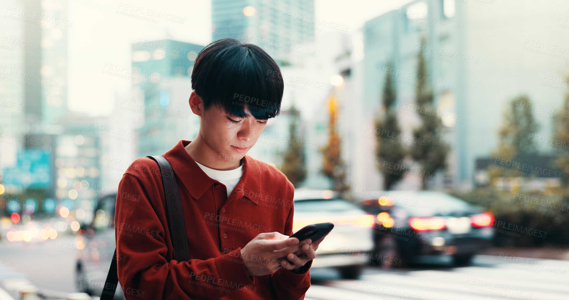 Buy stock photo City, walking and man on road with phone, morning commute or mobile app for street navigation. Urban, travel and Japanese university student on pedestrian crossing with smartphone for connectivity