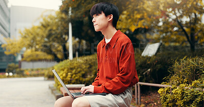 Buy stock photo Asian man, student and thinking in park with laptop, planning or creative writing for travel blog in Japan. Japanese person, computer or idea in Tokyo for storytelling, journal editing or email reply