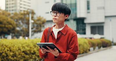 Buy stock photo Man, tablet and thinking for travel in city, notification and memory with social media on commute in street. Person, touchscreen and perspective with app for booking taxi on urban sidewalk in Japan