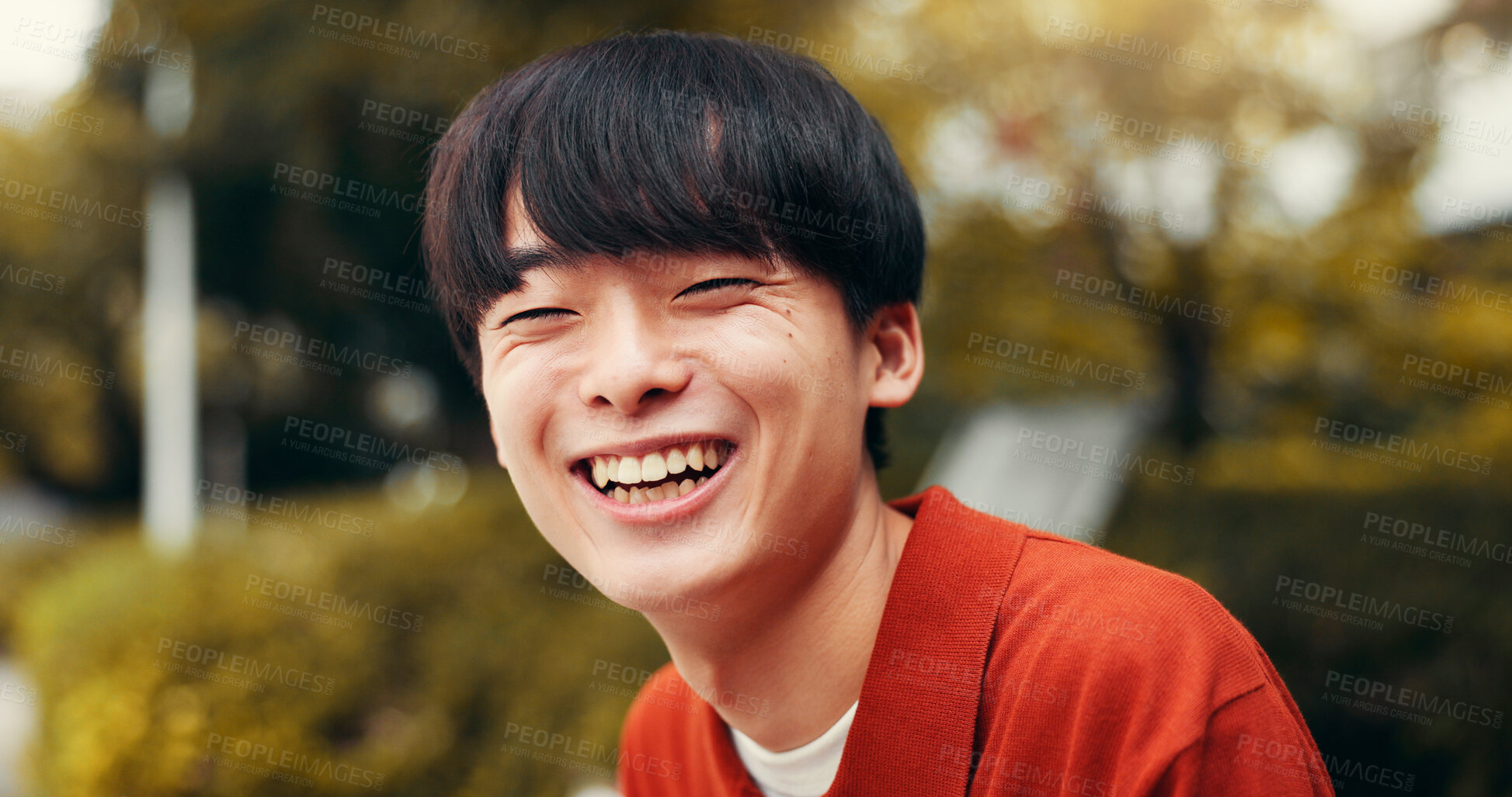 Buy stock photo Man, portrait and outdoor Japan for laughing, happy tourist and relax on bench in nature for peace. Male person, travel and journey to holiday destination for joke, funny humor and weekend for break