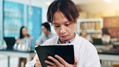 Buy stock photo Tablet, studying and man in university lab for science lecture with notes for exam or test. Digital technology, education and Japanese male student with biology research for college assignment.