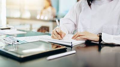 Buy stock photo Woman, hands and writing with notebook for research, study or medical discovery at laboratory. Closeup, female person or scientist taking notes in exam, test or clinic trial for lab results on desk