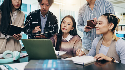 Buy stock photo Japanese people, meeting and laptop for video conference, collaboration and writing notes in office. Group, teamwork and technology for brainstorming, discussion and project management as colleagues