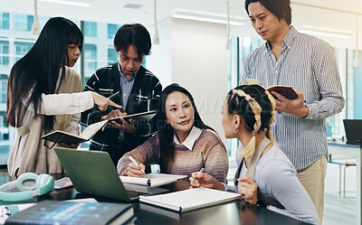 Buy stock photo Japanese business people, teamwork and laptop for meeting, collaboration and writing notes in office. Group, together and technology for brainstorming, discussion and project management as colleagues