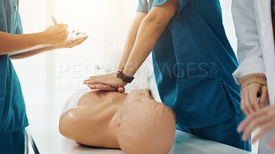 Buy stock photo Hands, medical school and cpr for emergency, education or practical training in hospital as students. People, learning and healthcare for wellness, knowledge and first aid on dummy for study in Japan