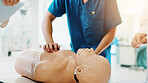 Dummy, student and cpr training in clinic for medical simulation exam, test or assignment. Healthcare, professor and person with rescue support demonstration on patient model at university in Japan.