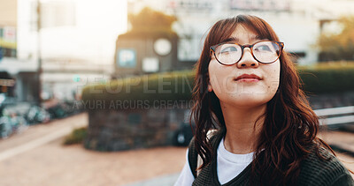 Buy stock photo Student, thinking and Asian woman in city for travel, morning commute and walking to university. Inspiration, ideas and person in urban town for education, learning and college at campus in Japan