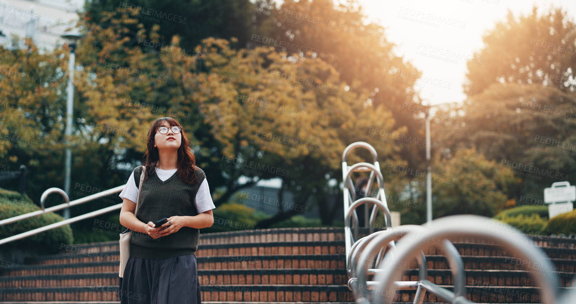 Buy stock photo Walking, steps and woman in city for travel with international exchange student program. Stairs, education and young female person on commuting journey in town for university or college in Japan.