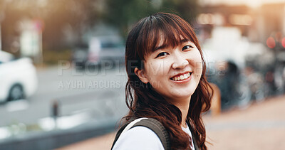 Buy stock photo Japanese woman, portrait and travel in city with smile, sunshine and sightseeing on summer vacation. Person, outdoor and excited on urban street for commute, tourism or happy on journey in town