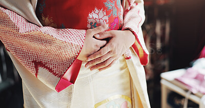 Buy stock photo Hands, kimono and traditional with style for person with embroidery, history and design at store. Tailor, clothes and culture with material, silk and heritage with indigenous fashion at shop in Japan