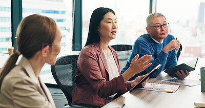 Buy stock photo Japan, teamwork and business people in meeting, tablet and conversation in office. Employees, corporate professional or coworkers with discussion, cooperation and research with planning or feedback