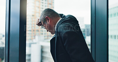 Buy stock photo Loss, window or businessman with stress, mistake or debt for bankruptcy, depression or worry. Glass, frustrated director or overwhelmed Japanese boss in office for deadline, fatigue or audit crisis