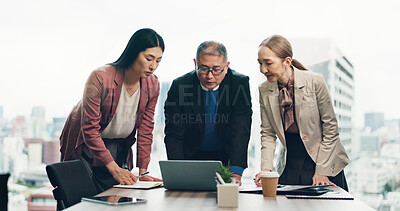 Buy stock photo Laptop, group and Japanese business people planning, solution and reading with mature CEO. Teamwork, collaboration and project discussion for sales budget, finance or profit email in office meeting