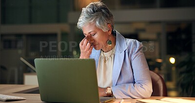 Buy stock photo Thinking, burnout and mature woman with headache, night and financial crisis in company, tired and stress. Exhausted, accountant and person with laptop, fatigue and  migraine for overtime in office