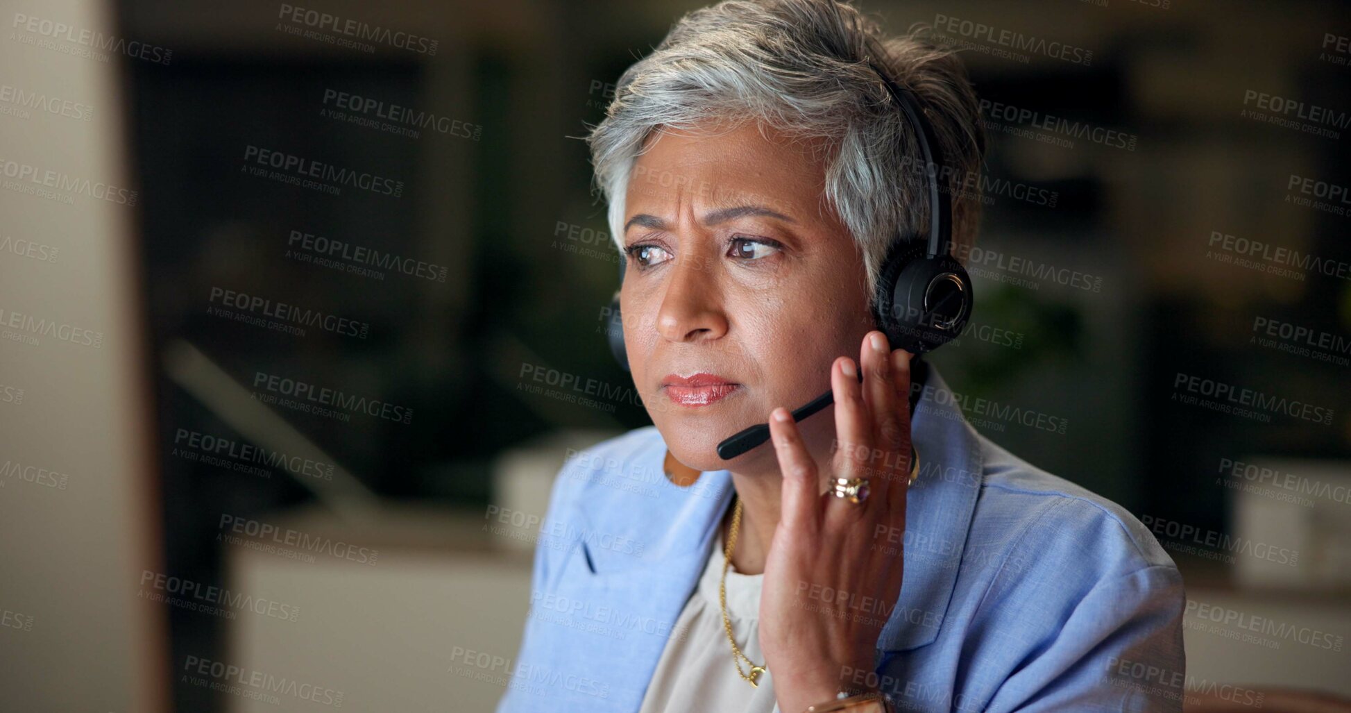 Buy stock photo Mature woman, consultant and night with headset for telecommunication, customer support or service at office. Female person, agent or employee working late with headphones for online assistance