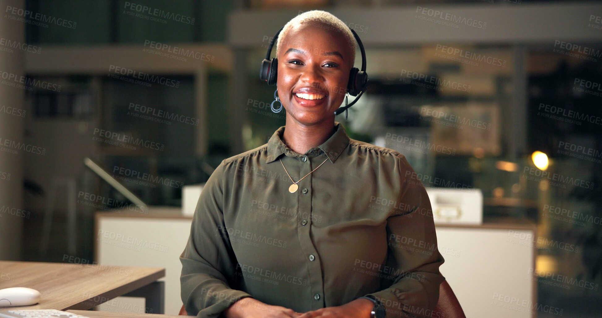 Buy stock photo Call center, happy black woman and portrait for customer service or support at help desk at night. Face, smile and receptionist in office for telemarketing, professional business or overtime in Kenya