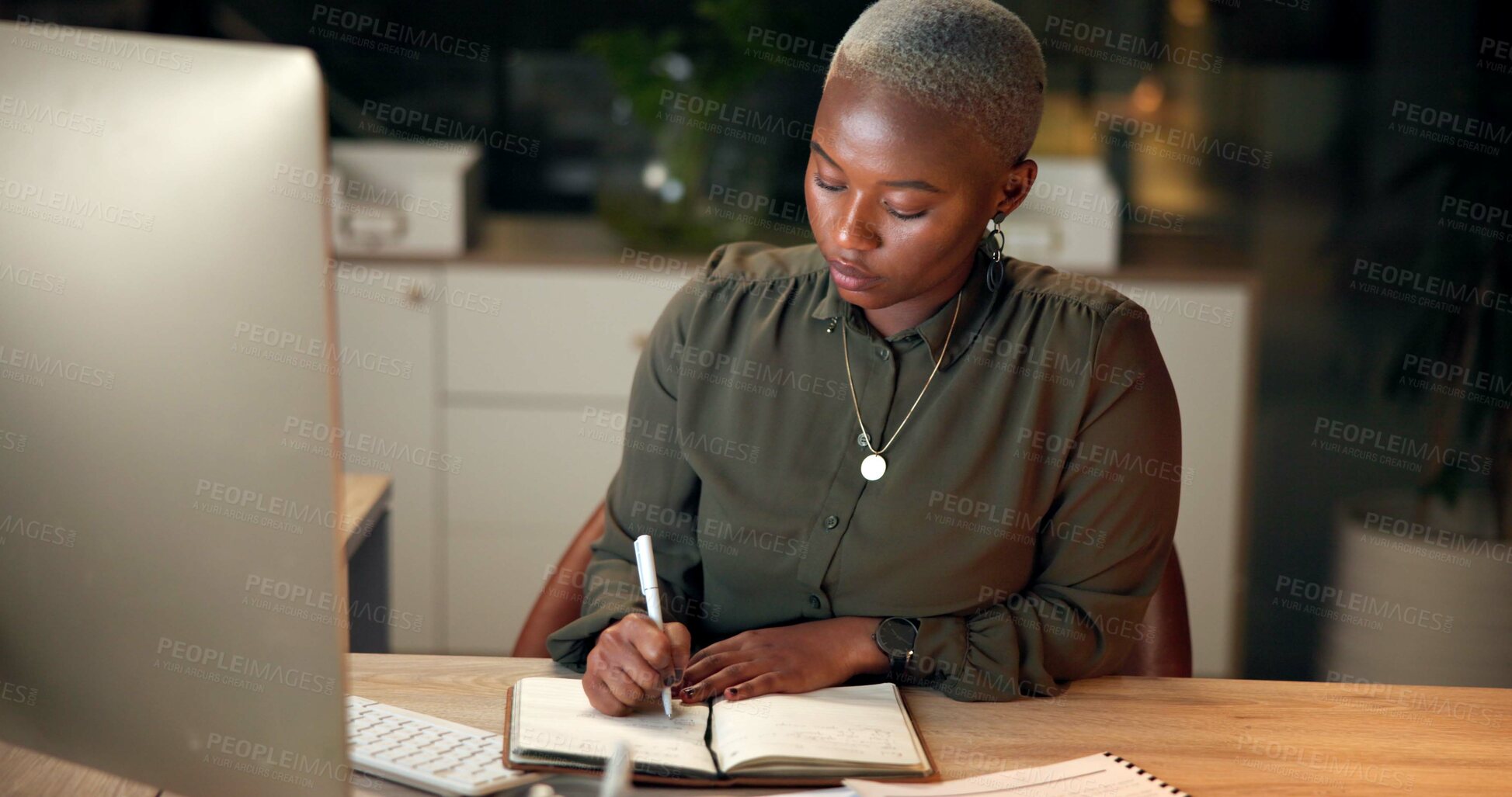 Buy stock photo Night, writing and business with black woman in office, computer and deadline for project. African person, employee or consultant with notebook, schedule for proposal or evening with planning or idea