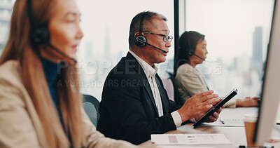 Buy stock photo Call center, headset and businessman in office for customer service, crm or online consultation. Telemarketing, contact and male technical support advisor with mic tech for ecommerce query in Japan.