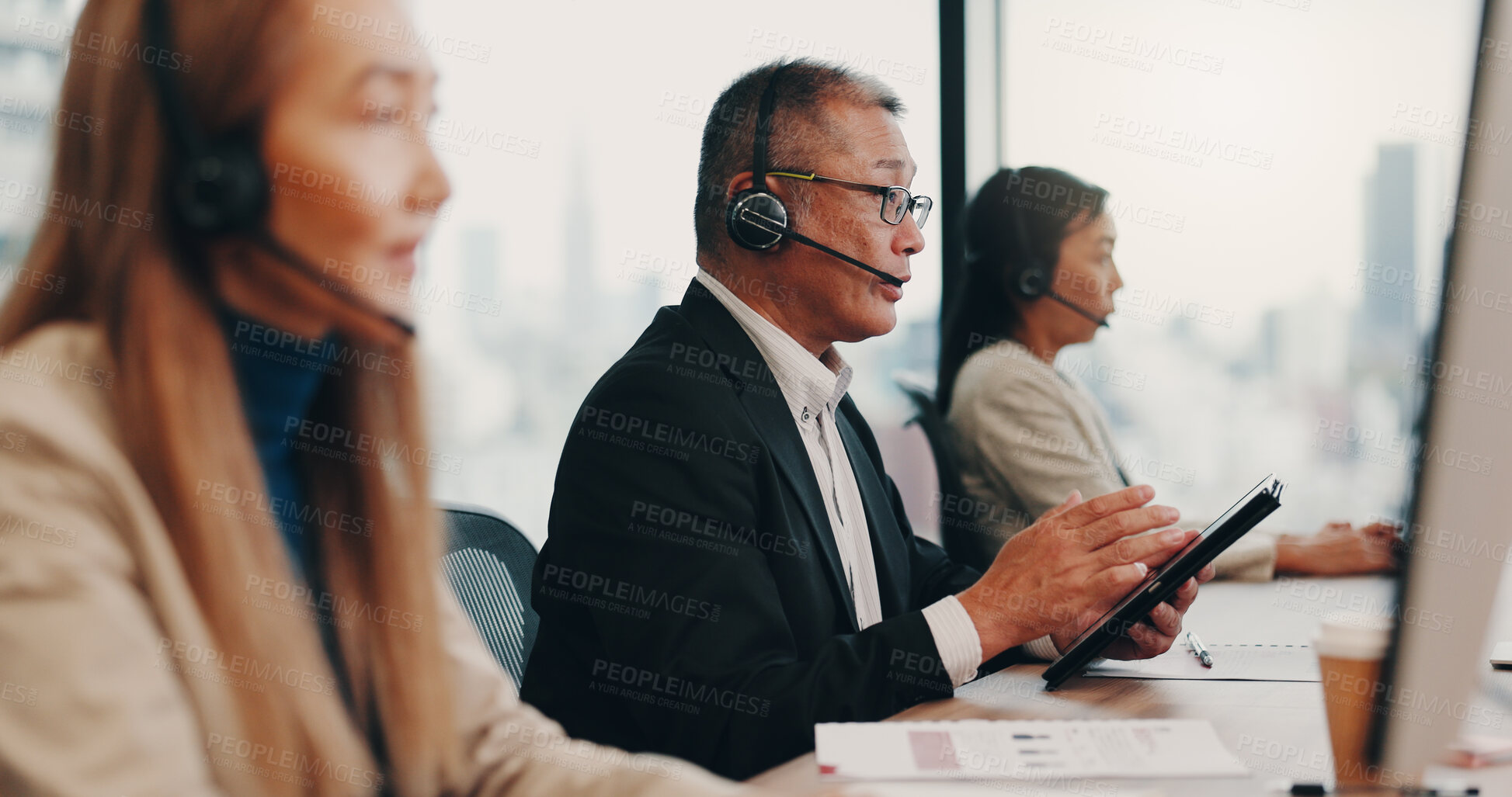 Buy stock photo Call center, headset and businessman in office for customer service, crm or online consultation. Telemarketing, contact and male technical support advisor with mic tech for ecommerce query in Japan.