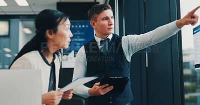 Buy stock photo Business people, pointing or presentation with tablet for project planning, collaboration or schedule at office. Japan, businessman or woman with document or technology for brainstorming at workplace