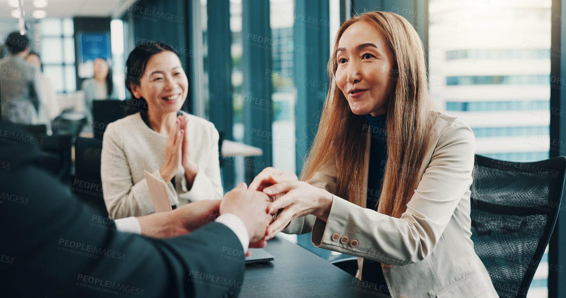 Buy stock photo People, happy and handshake in office for business deal, agreement or applause for successful merger. Company team, Japanese woman or shaking hands with man for welcome, settlement or new partnership