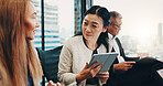 Business people, meeting and Asian women in office on tablet for planning, discussion and review. Corporate, Japan company and workers on digital tech for online report, teamwork and collaboration