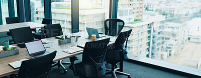 Buy stock photo Empty, notes and chairs by table for conference room, corporate company and meeting boardroom. Vacant, interior furniture and laptop in workplace for planning, business brief and tech agency in Japan