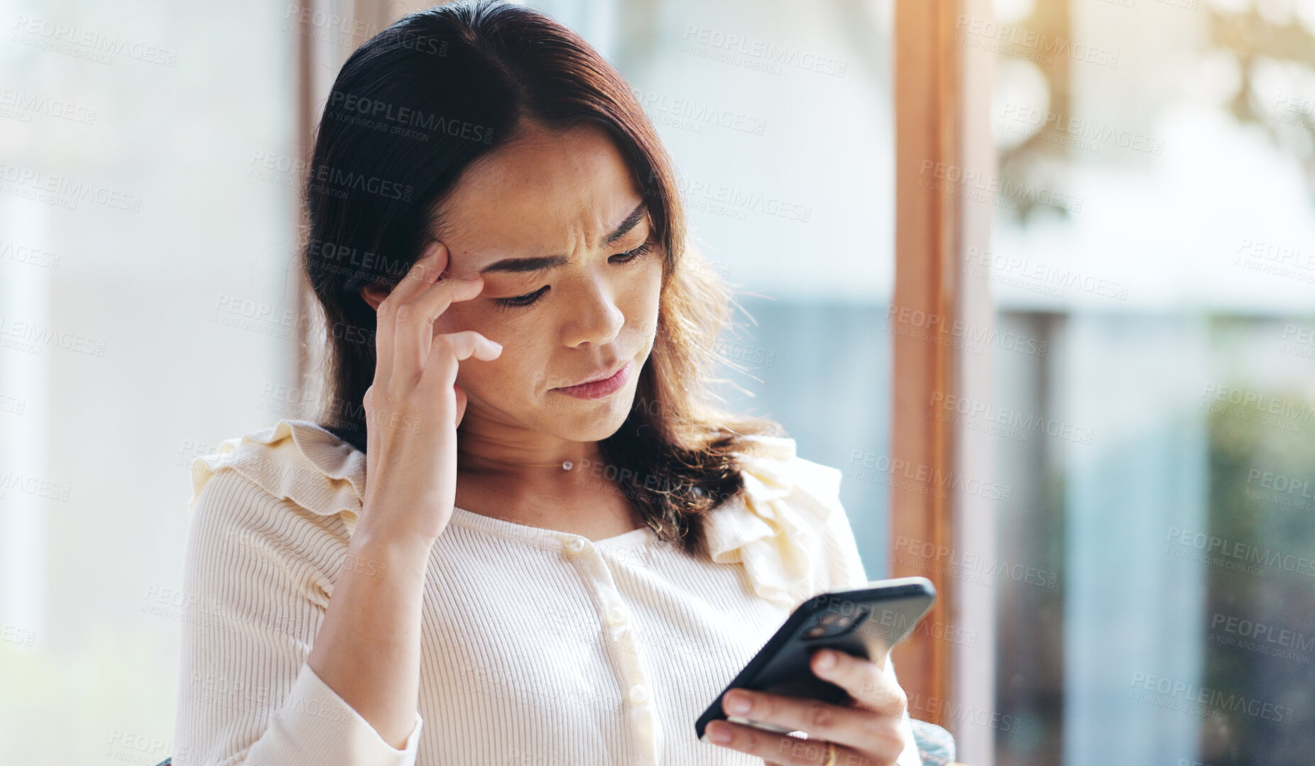 Buy stock photo Japanese, woman and stress with phone at house of social media scam, network glitch and phishing anxiety. Confused, person and migraine with mobile for fake news, fraud notification and spam in Japan