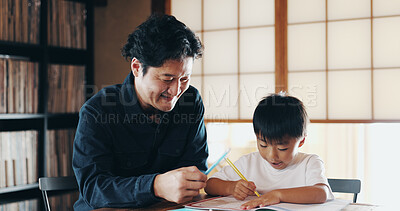 Buy stock photo Education, man and child in home for learning, help and school assignment with advice. Japanese father, kid and writing in living room for math lesson, support and studying homework for development