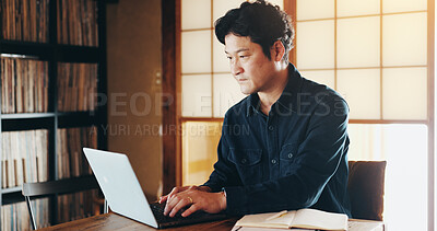 Buy stock photo Japanese, man and typing on laptop at house for schedule, email and mortgage application. Person, online and journal notes with financial planner, investment feedback and property insurance in Japan