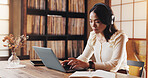 Woman, headphones or typing on laptop at house of schedule, finance planner and mortgage application. Person, listen to music and financial budget, investment feedback and property insurance in Japan