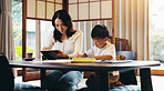 Asian mother, child and learning with tablet for education, homeschooling or youth development at home. Mom, boy or kid with homework or technology for knowledge, creativity or tutoring in Japan