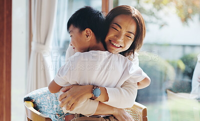 Buy stock photo Japanese, mother and hug child at house with love, care and bonding together for childhood development. Smile, woman and boy with embrace for security, family relationship and weekend visit in Japan